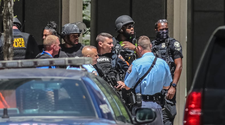 Police swarmed Midtown Atlanta on May 3, 2023, after five people were shot. John Spink / AJC