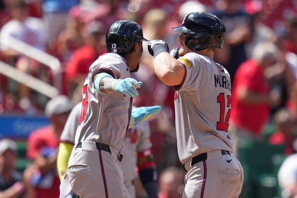 Atlanta Braves' Sean Murphy, right, is congratulated by teammate Ronald Acuna Jr. after hitting a three-run home run during the eighth inning of a baseball game against the St. Louis Cardinals Saturday, July 12, 2025, in St. Louis. (AP Photo/Jeff Roberson)