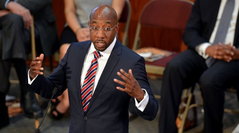 The Rev. Raphael Warnock is considering a run for the U.S. Senate against Republican U.S. Sen. Johnny Isakson. Warnock is the pastor of Ebenezer Baptist Church in Atlanta, where the Rev. Martin Luther King Jr. served as as pastor during the civil rights movement. KENT D. JOHNSON/KDJOHNSON@AJC.COM