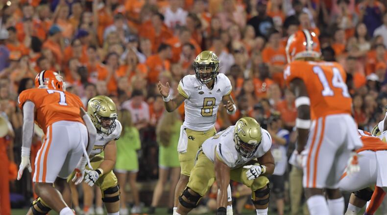 Georgia Tech quarterback Tobias Oliver (8) shouts instructions in the first half at Memorial Stadium on the Clemson University campus in Clemson, S.C. on Thursday, August 29, 2019. Georgia Tech took the field for the first time with Geoff Collins as head coach. (Hyosub Shin / Hyosub.Shin@ajc.com)