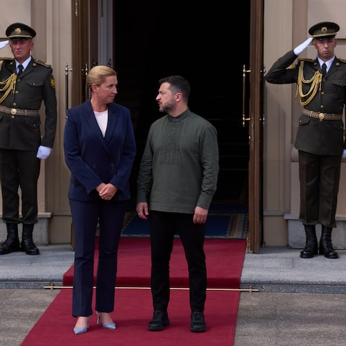 Danish Prime Minister Mette Frederiksen, left, is welcomed by President Volodymyr Zelenskyy during a Ukrainian and Nordic-Baltic countries summit in Kyiv, Sunday, Aug. 23, 2026. (AP Photo/Francisco Seco)