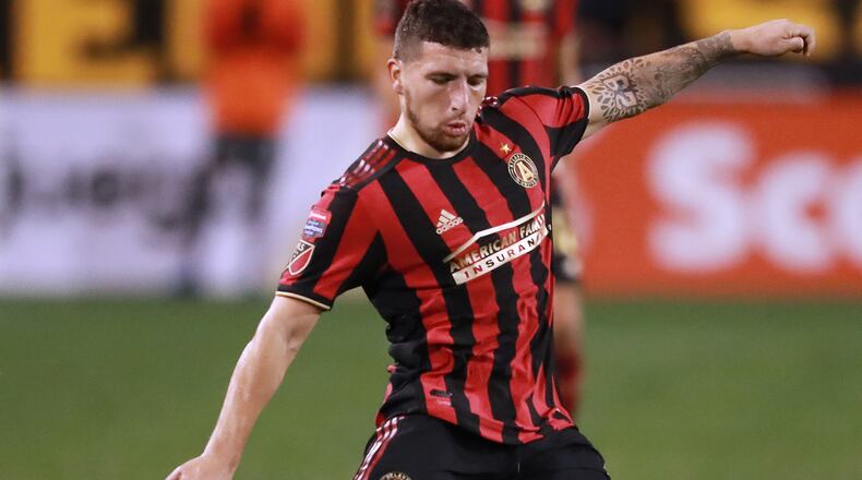 Atlanta United midfielder Eric Remedi works against C.S. Herediano in their CONCACAF Champions League soccer match on Thursday, Feb. 28, 2019, in Kennesaw.