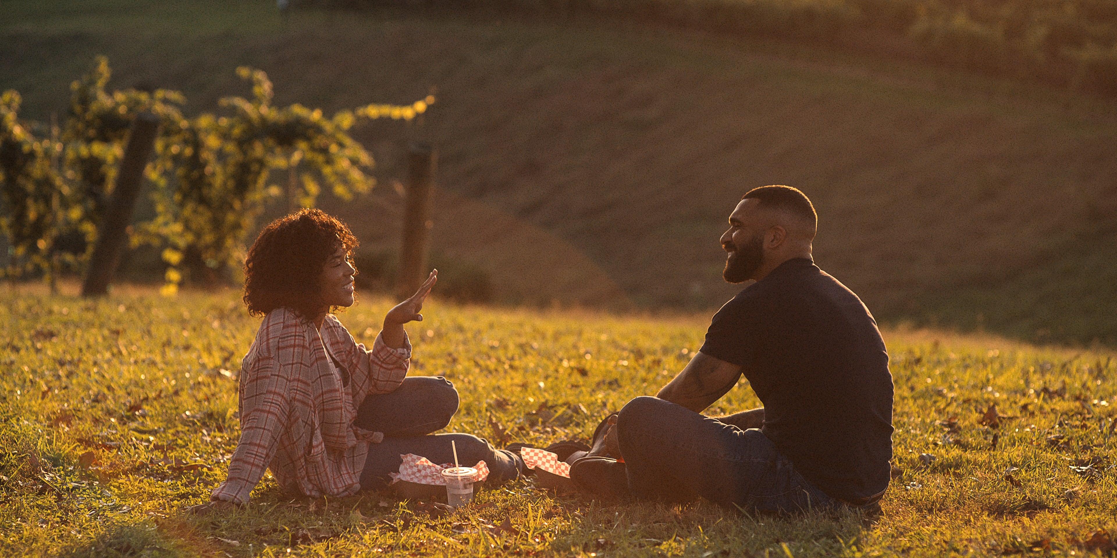 Serayah McNeill (left) as grape picker Ruth and Tyler Lepley as winery owner Boaz fall in love in "Ruth & Boaz" on Netflix. (Courtesy of Perry Well Films 2/Netflix)