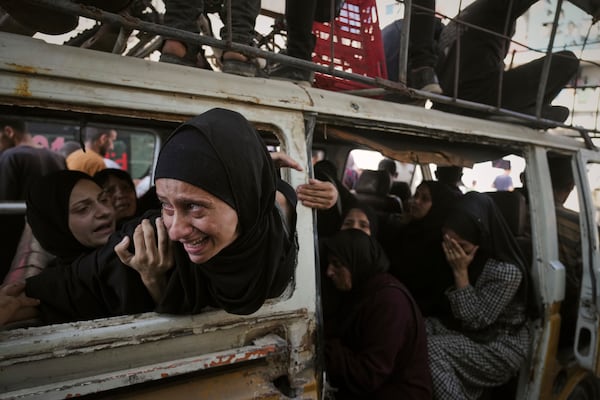 Palestinians mourn their relatives killed from an Israeli army bombardment of Gaza, at Shifa Hospital in Gaza City Tuesday, July 22, 2025. (AP Photo/Jehad Alshrafi)