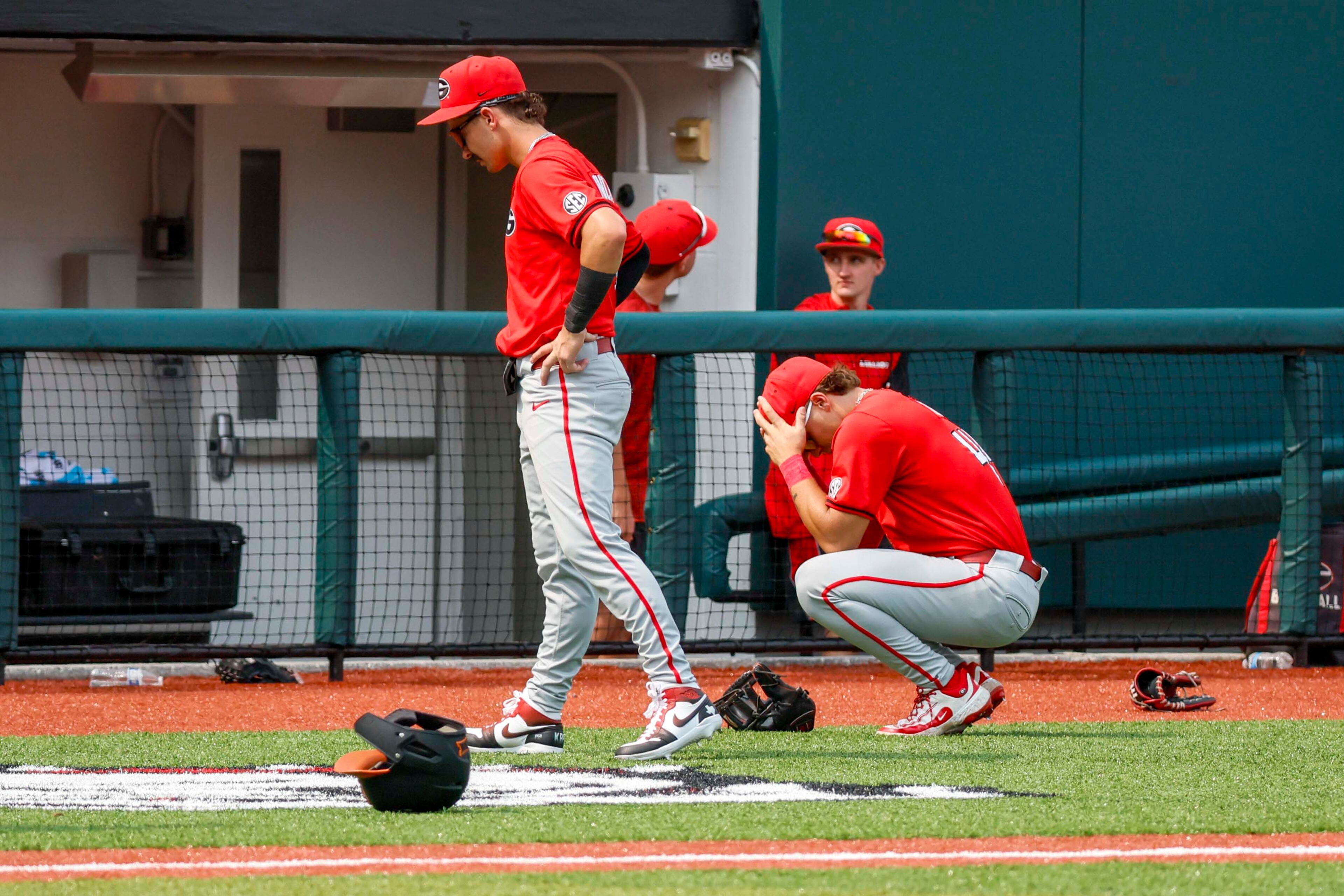 Georgia players react after losing against Oklahoma State on a walk-off homer during the ninth inning in their NCAA Regional game at Foley Field, Sunday, June 1, 2025, in Athens, Ga. Oklahoma State defeated Georgia 11-9.
(Miguel Martinez/ AJC)