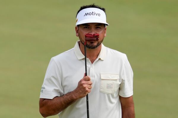 Jason Day, of Australia, reacts after missing a putt on the eighth hole during the third round at the Masters golf tournament, Saturday, April 12, 2025, in Augusta, Ga. (AP Photo/Ashley Landis)
