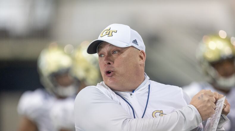 Head coach Geoff Collins talks with players during the first day of spring practice for Georgia Tech football at Alexander Rose Bowl Field in Atlanta, GA., on Thursday, February 24, 2022. (Photo Jenn Finch)