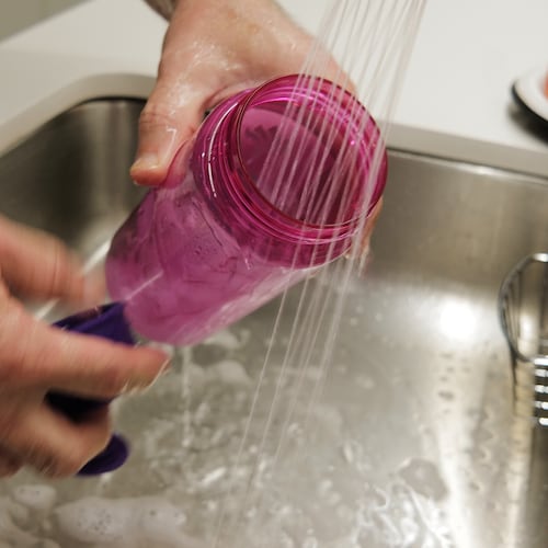 A reusable water bottle is washed in New York on Thursday, Oct. 16, 2025. (AP Photo/Patrick Sison)