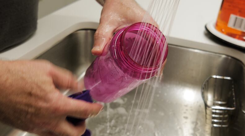 A reusable water bottle is washed in New York on Thursday, Oct. 16, 2025. (AP Photo/Patrick Sison)