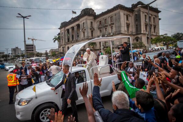 FILE - Pope Francis waves to well wishers as he leaves after a meeting at the Cathedral of the Immaculate Conception in the capital Maputo, Mozambique, Thursday, Sept. 5, 2019. (AP Photo/Ben Curtis, file)