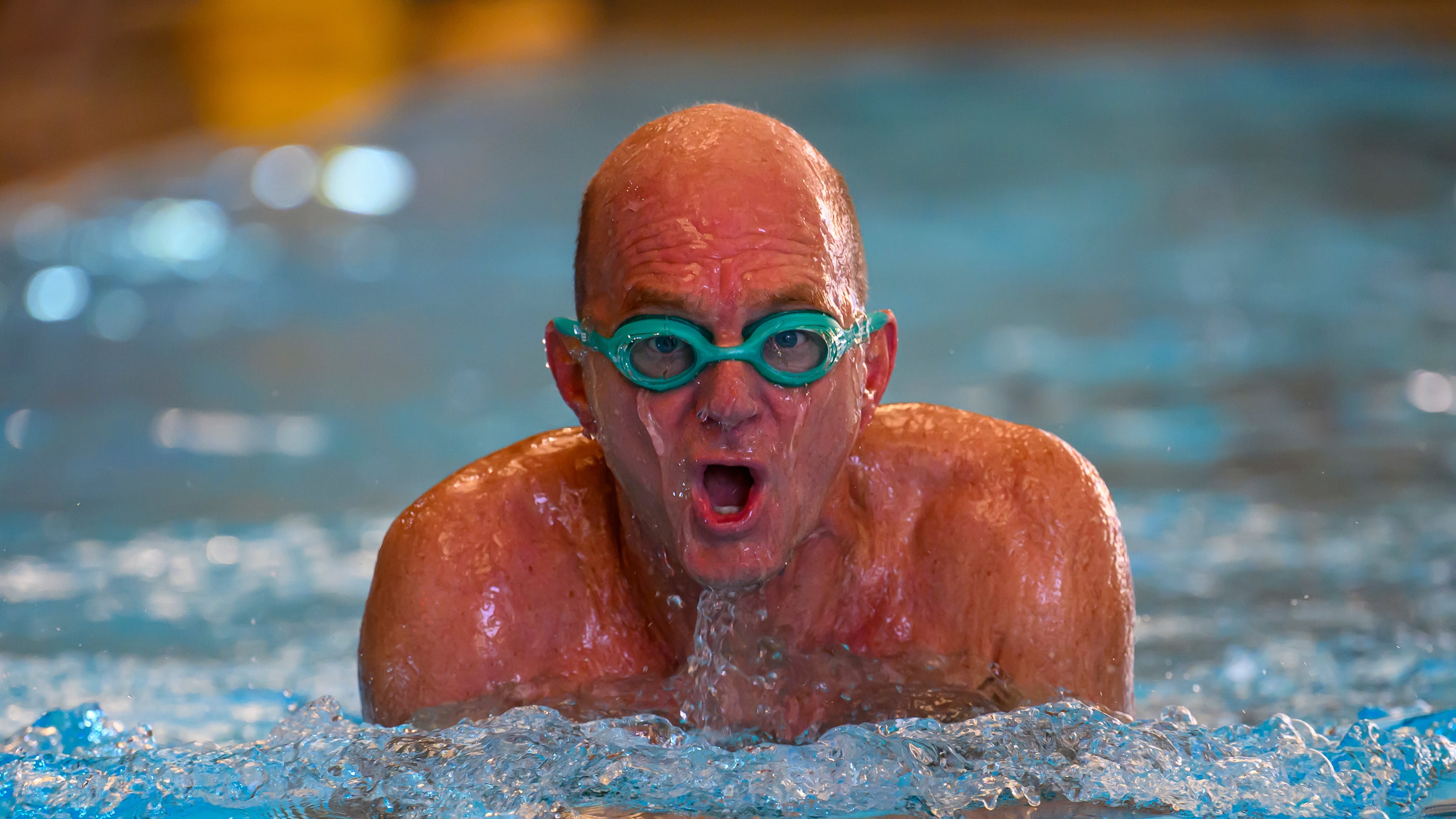 Former Olympic swimmer Rowdy Gaines swims, Tuesday, Nov 11, 2025 at a pool in Salt Lake City. (AP Photo/Tyler Tate)