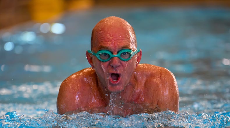 Former Olympic swimmer Rowdy Gaines swims, Tuesday, Nov 11, 2025 at a pool in Salt Lake City. (AP Photo/Tyler Tate)