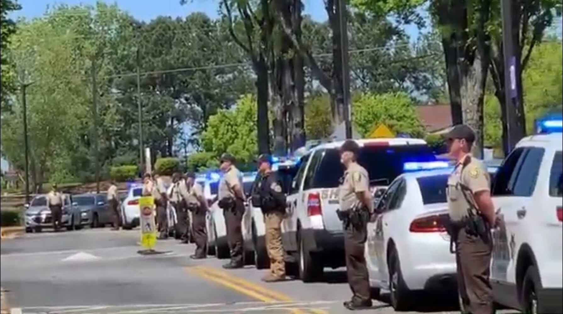Cobb sheriff’s deputies form parade to honor frontline healthcare workers