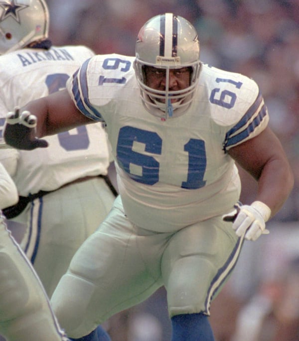 FILE - Dallas Cowboys offensive lineman Nate Newton is in action against the Philadelphia Eagles during the NFC divisional playoffs in Irving, Texas, Jan. 7, 1996. (AP Photo/David Phillip, File)