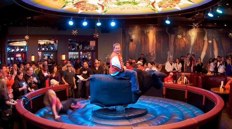 A Professional Bull Riders bar and its mechanical bull are coming to The Battery Atlanta. Here's what it looks like at XFINITY Live! in Philadelphia.