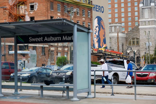 Pedestrians walk along Edgewood Ave opposite the Municipal Market on Wednesday, July 30, 2025. Last week, Sweet Auburn saw a violent incident that caused one death and ten injuries.
(Miguel Martinez/ AJC)