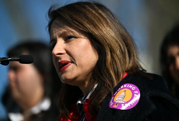 Gigi Pedraza, executive director and founder of Latino Community Fund Georgia — pictured speaking in front of the Georgia State Capitol in March 2025 — said she worried that Justice Brett Kavanaugh siding with the dissenters who said President Donald Trump's executive order didn’t violate the Constitution "left the door open to potential exceptions" in the future. (Hyosub Shin/AJC)