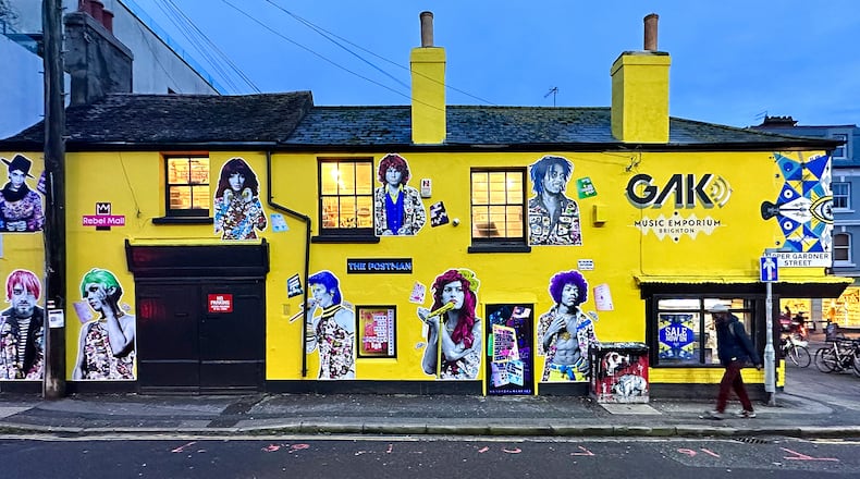 The Gak Music Emporium in Brighton, England, hosts the work of British sticker artist duo The Postman.
Photo: Courtesy of Trey Reames