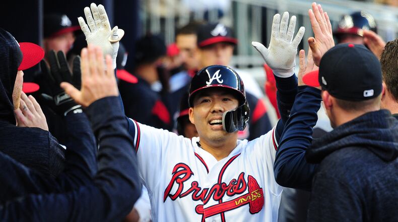 Kurt Suzuki is congratulated by teammates after hitting a first inning, two-run home run against the New York Mets at SunTrust Park on April 19, 2018 in Atlanta, Georgia. (Photo by Scott Cunningham/Getty Images)