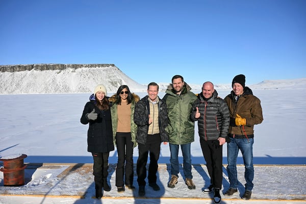 Vice President JD Vance, center, poses with second lady Usha Vance, White House national security adviser Mike Waltz,his wife , former homeland security adviser, Julia Nesheiwat, left, and Secretary of Energy Chris Wright, right, as they tour the U.S. military's Pituffik Space Base in Greenland, Friday, March 28, 2025. (Jim Watson/Pool via AP)