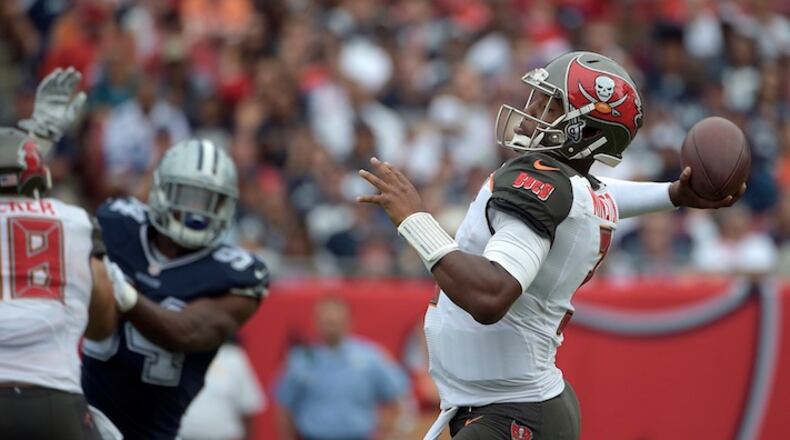 Tampa Bay Buccaneers quarterback Jameis Winston (3) throws a pass against the Dallas Cowboys during the second quarter of an NFL football game Sunday, Nov. 15, 2015, in Tampa, Fla. (AP Photo/Phelan M. Ebenhack)