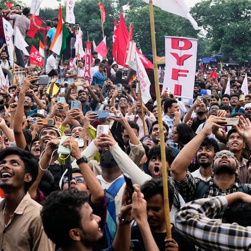 Student wing activists of different political parties join in a rally demanding educational reforms as part of the Cockroach Janta Party's ongoing protest movement, in Kolkata, India, Friday, July 24, 2026. (AP Photo/Bikas Das)