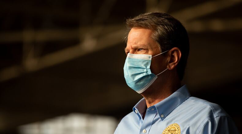 Georgia Gov. Brian Kemp speaks at the Peachtree-Dekalb Airport in Atlanta on Thursday, July 1, 2020. Kemp and Georgia Department of Public Health (DPH) Commissioner Dr. Kathleen Toomey will take part in a “Wear a Mask” Flyaround Tour of Georgia, encouraging Georgians to follow the guidance of public health officials to stop the spread of COVID-19 ahead of the 4th of July Weekend. (Rebecca Wright for The Atlanta Journal-Constitution)