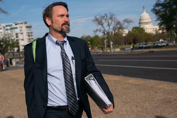 Daniel Matheson, a lawyer for the Federal Trade Commission, departs following the first day of a historic antitrust trial about Meta CEO Mark Zuckerberg's intentions in acquiring Instagram, at Barrett Prettyman United States Court House in Washington, Monday, April 14, 2025. (AP Photo/Nathan Howard)