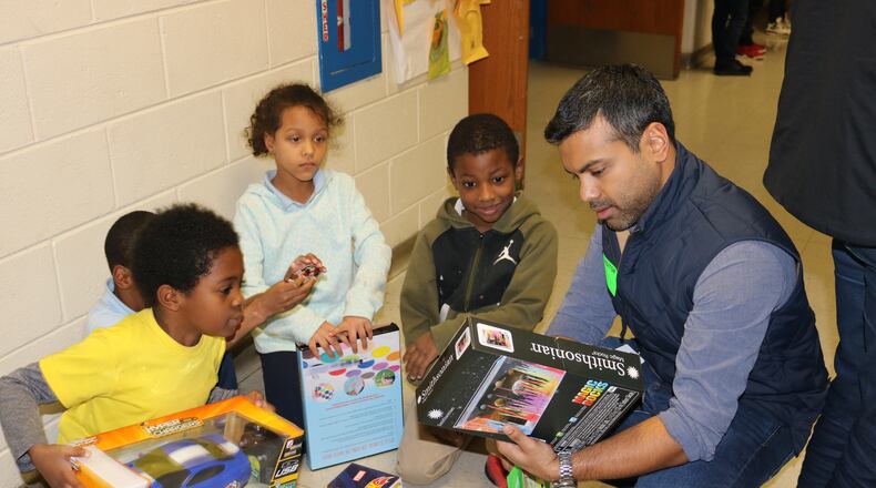 Avondale Elementary School students received gifts in December, hand-delivered by local software company Salesforce. (PHOTO COURTESY DEKALB COUNTY SCHOOL DISTRICT)
