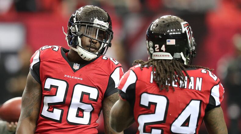 The Falcons have the NFL's best backfield duo in Tevin Coleman (left) and Devonta Freeman going into the 2017 season, according to Fox Sports. Curtis Compton/ccompton@ajc.com