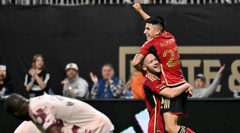 Atlanta United's midfielder Thiago Almada (23) is celebrated by Atlanta United's defender Andrew Gutman after scoring during the second half in a MLS soccer match at Mercedes-Benz Stadium, Saturday, March 18, 2023, in Atlanta. Atlanta United won 5-1 over Portland Timbers. (Hyosub Shin / Hyosub.Shin@ajc.com)
