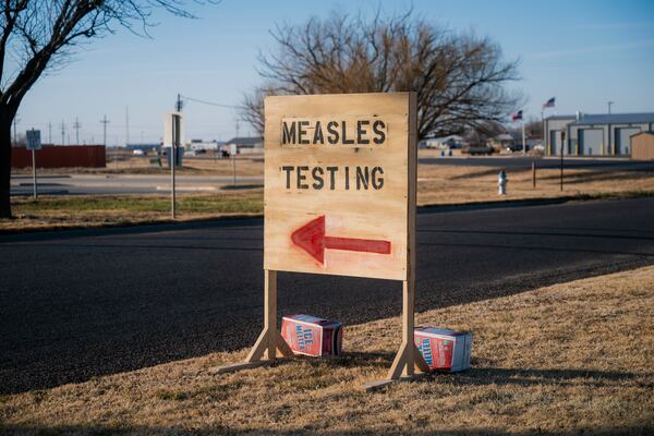 
                        FILE — A sign for measles testing in Seminole, Texas, Feb. 26, 2025. As containment efforts falter, the measles outbreak in West Texas is likely to persist for a year, perhaps even setting back the country’s hard-fought victory over the virus, according to Texas health officials. (Desiree Rios/The New York Times)
                      