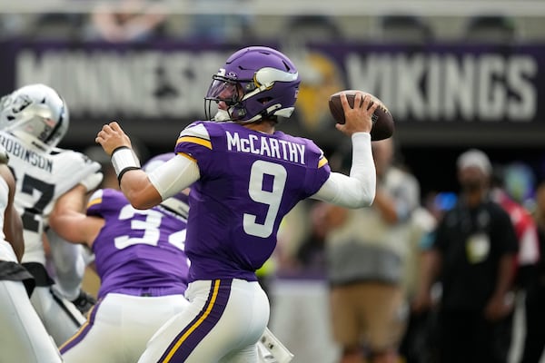 FILE - Minnesota Vikings quarterback J.J. McCarthy (9) throws a pass during the first half of an NFL preseason football game against the Las Vegas Raiders, Aug. 10, 2024, in Minneapolis. (AP Photo/Charlie Neibergall, file)