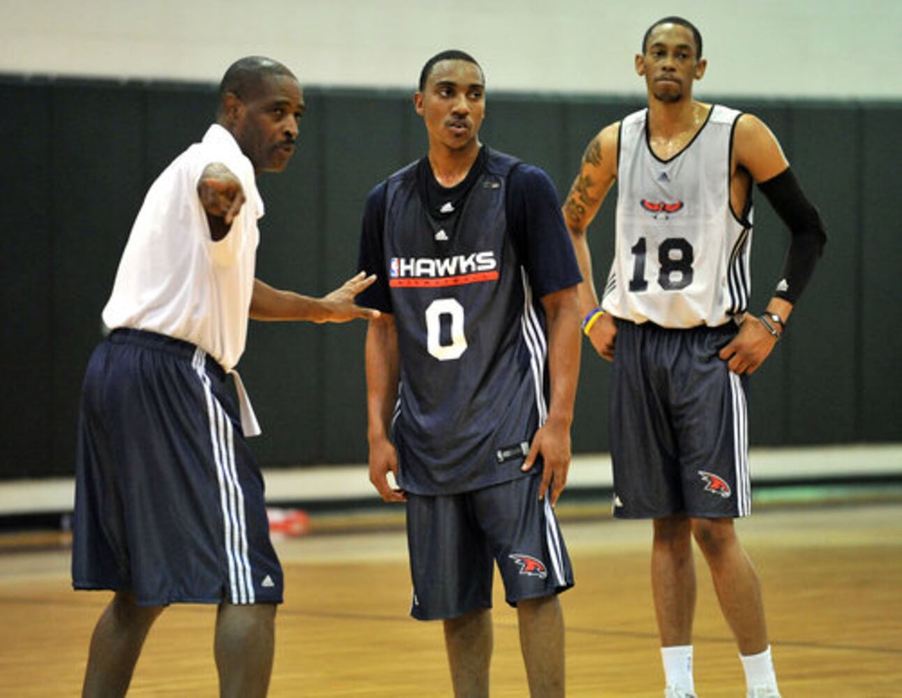 New coach, guard for Hawks
