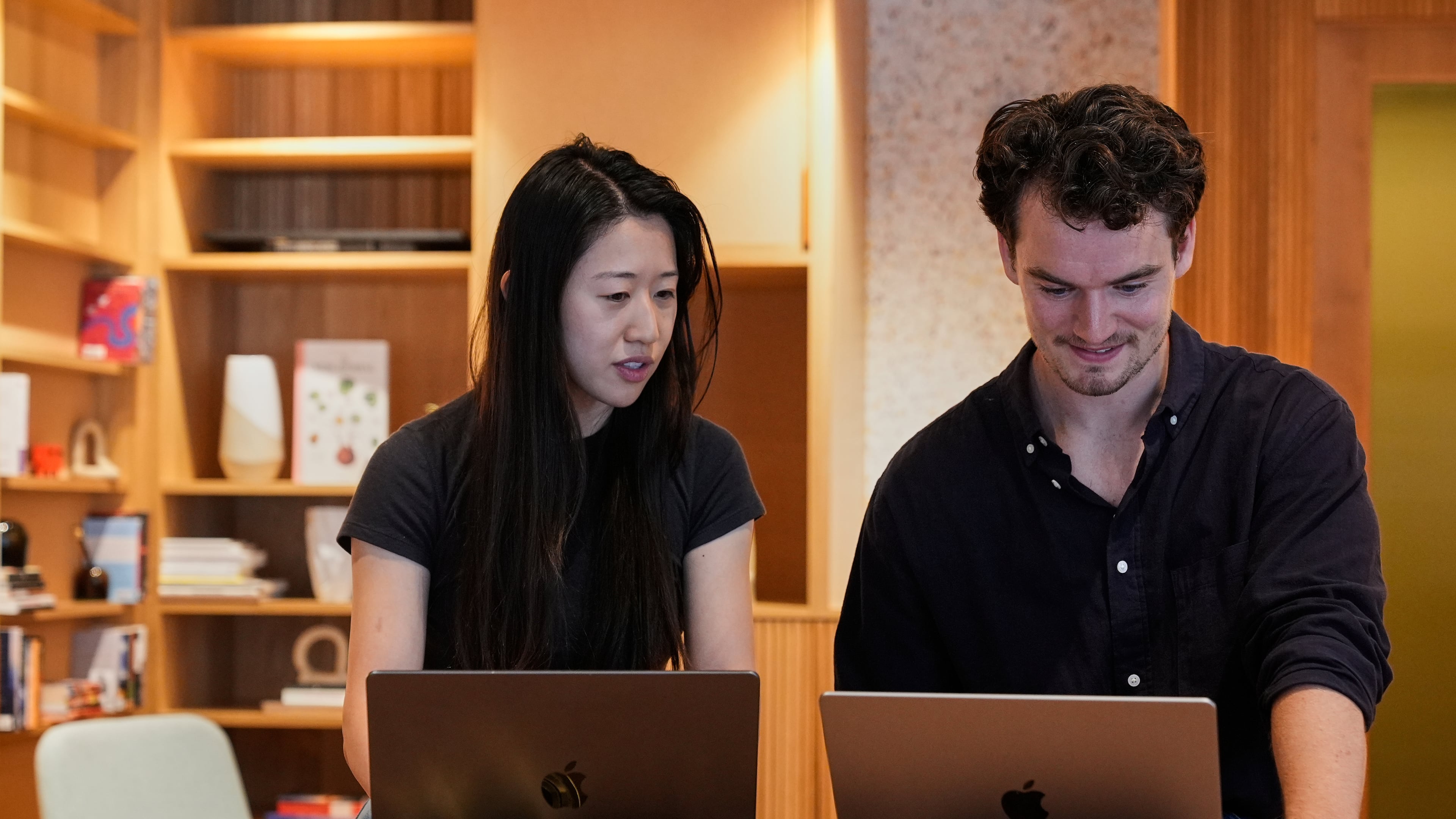 Claude code product manager Cat Wu, left, and Alex Albert, head of Claude relations, work inside Anthropic headquarters in San Francisco, Wednesday, Aug. 27, 2025. (AP Photo/Godofredo A. Vásquez)