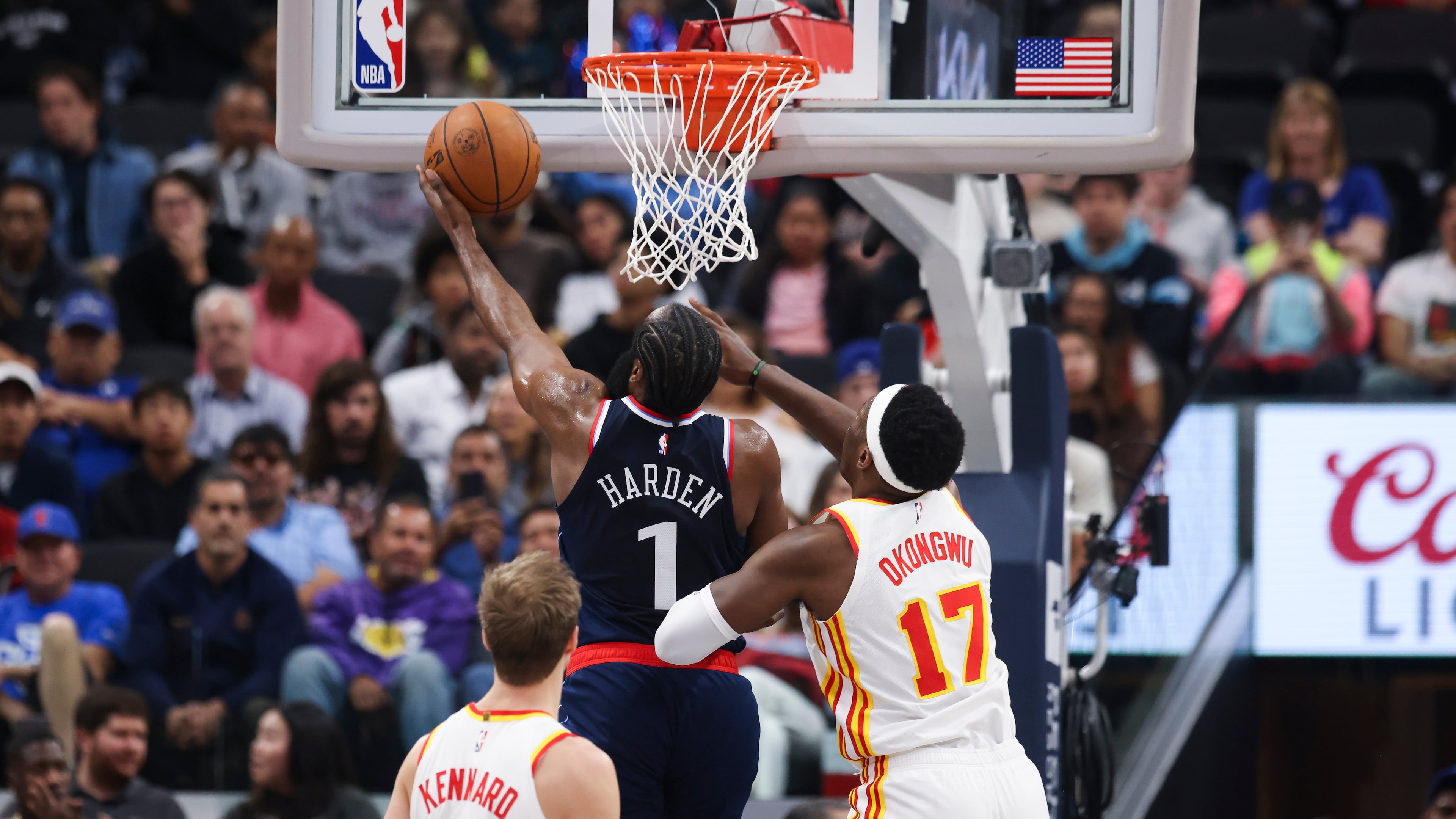 Los Angeles Clippers guard James Harden drives to the basket against Atlanta Hawks forward Onyeka Okongwu as guard Luke Kennard watches during the first half of an NBA basketball game Monday, Nov. 10, 2025, in Inglewood, Calif. (Jessie Alcheh/AP)