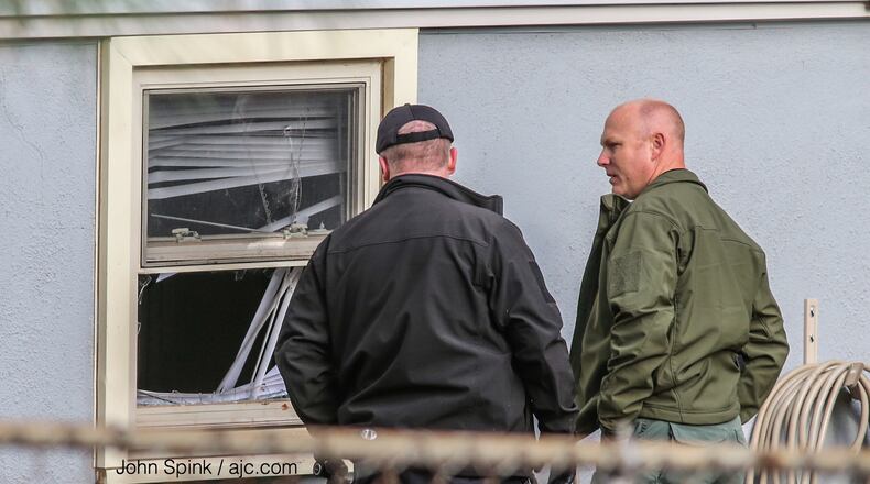 Cherokee County sheriff's deputies investigated after a homeowner shot an accused burglar.