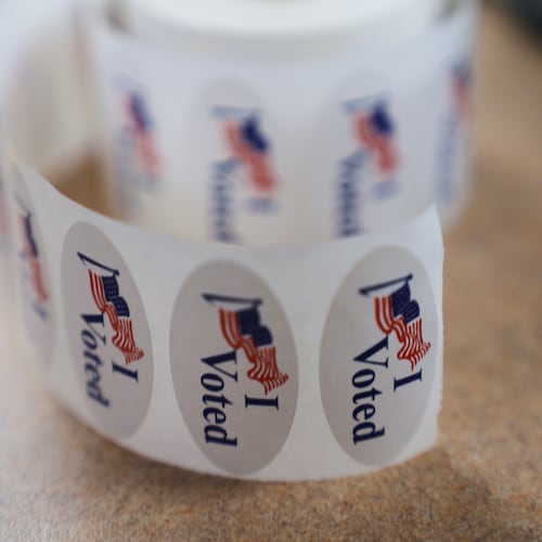 Labels reading "I Voted" are seen at the Orange County Registrar of Voters office in Santa Ana, Calif., on Wednesday, Oct. 29, 2025. (AP Photo/Damian Dovarganes)