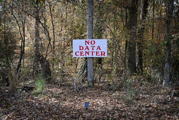 A “No Data Center” sign is displayed near a proposed data center site, Wednesday, Nov. 19, 2025, in Dry Branch. (Hyosub Shin/AJC)