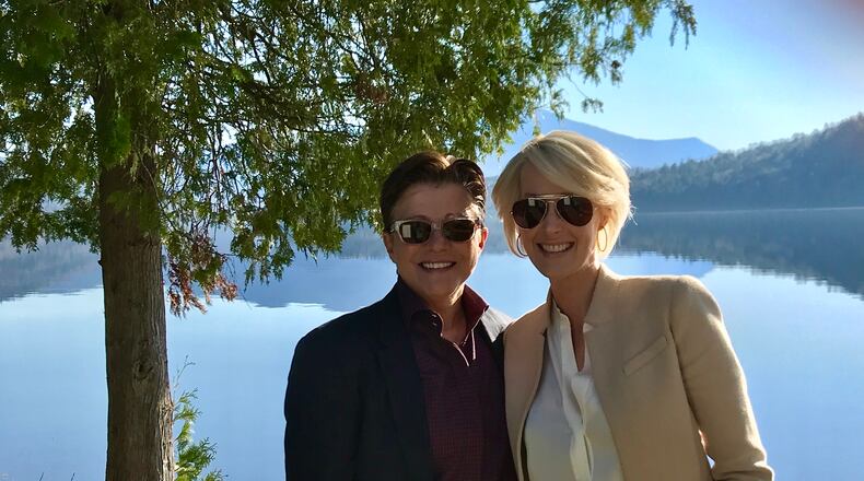 Michelle LeClair (right) with partner Tena Clark. In a new memoir, LeClair writes about her escape from Scientology after she was outed as a gay woman.