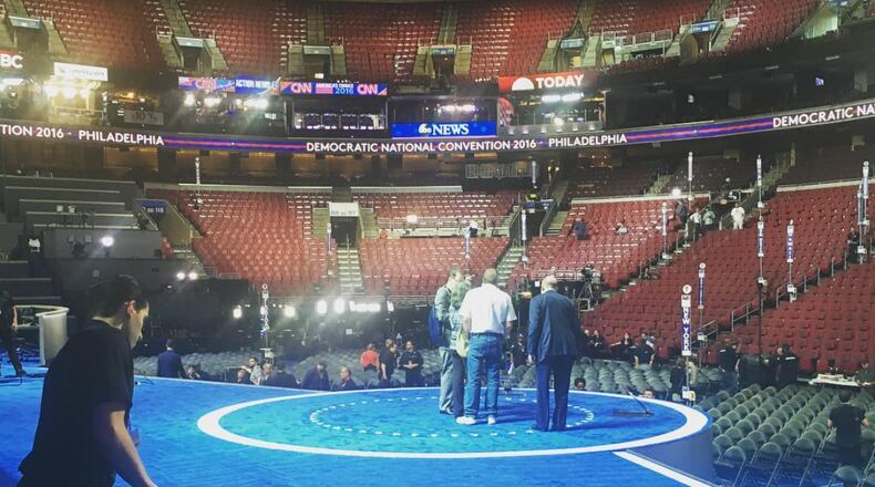 They're rolling out - and vacuuming - the blue carpet. Photo: Brooks Bell