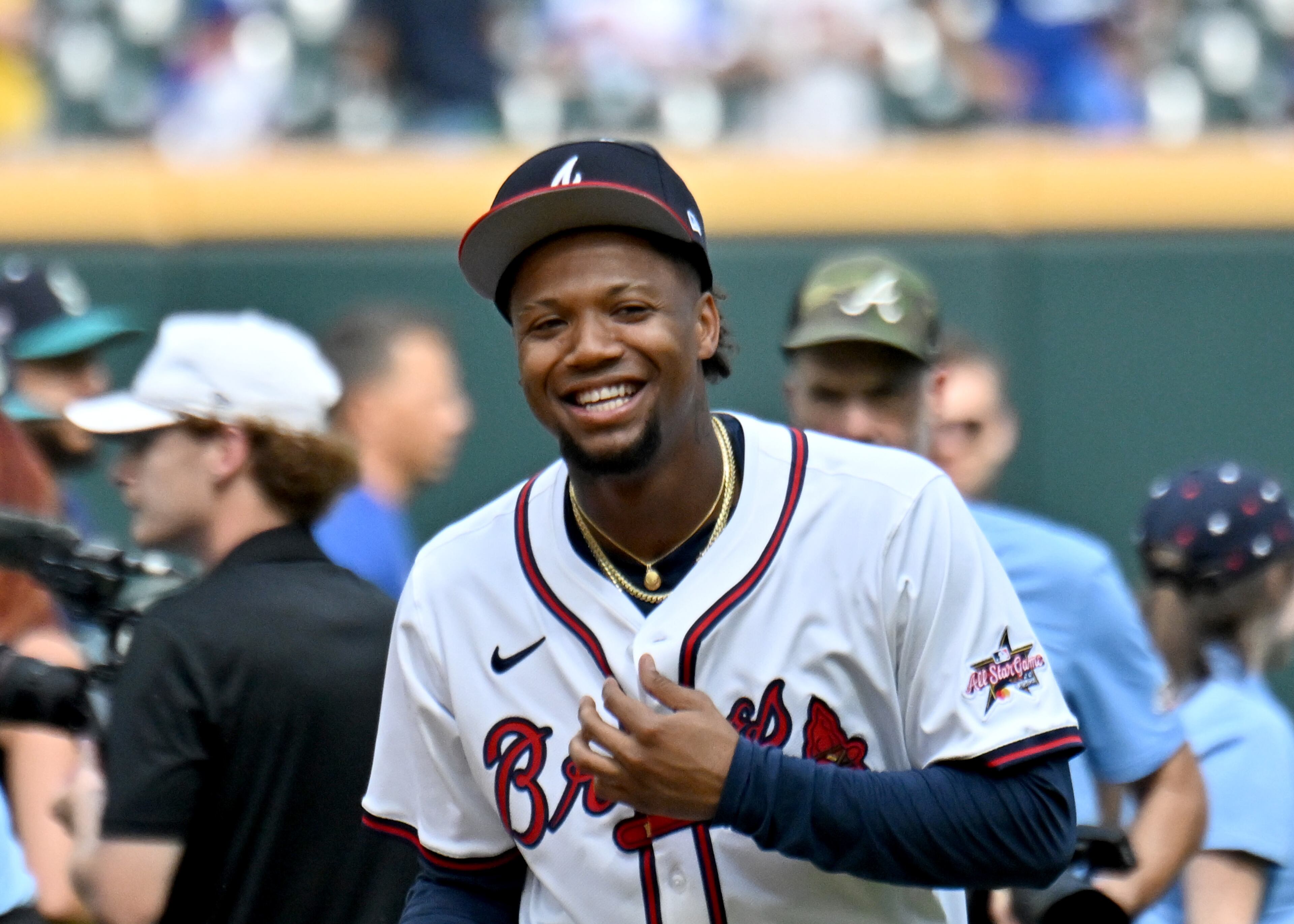 Atlanta Braves outfielder Ronald Acuña Jr. reacts as he walks onto the baseball field before the 2025 MLB All-Star Game at Truist Park, Tuesday, July 15, 2025, in Atlanta. (Hyosub Shin/AJC)