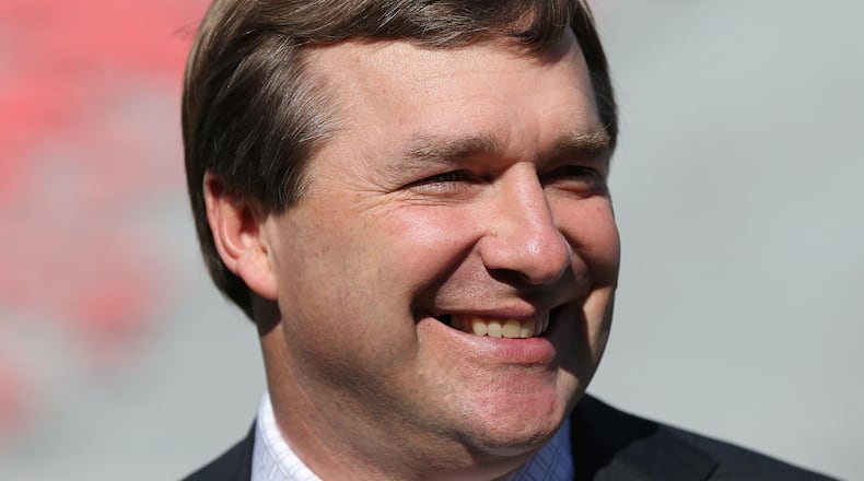 November 18, 2017 Athens: Georgia head coach Kirby Smart arrives with his team during the Dawg Walk before playing Kentucky in a NCAA college football game on Saturday, November 18, 2017, in Athens. Curtis Compton/ccompton@ajc.com