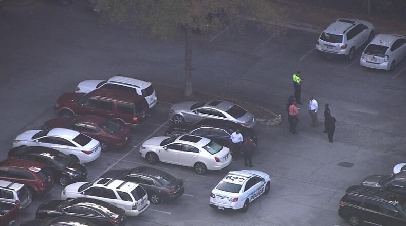 About 10 a.m., a call came in to police about a car in the north parking lot of the H.E. Holmes MARTA station, MARTA spokeswoman Alisa Jackson said. (Credit: Channel 2 Action News)