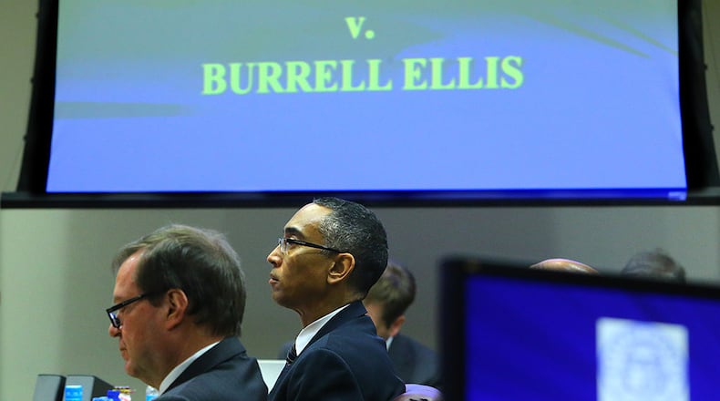 DeKalb County CEO Burrell Ellis, right, was charged with intimidating companies doing business with DeKalb County into giving contributions to his 2012 re-election campaign. He’s seated beside his attorney Craig Gillen. CURTIS COMPTON