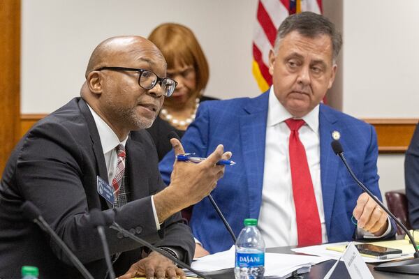Democratic state Sen. Harold Jones II (left) was elected to be the new Senate minority leader. He is pictured at the Capitol with Republican Rep. Steve Gooch.