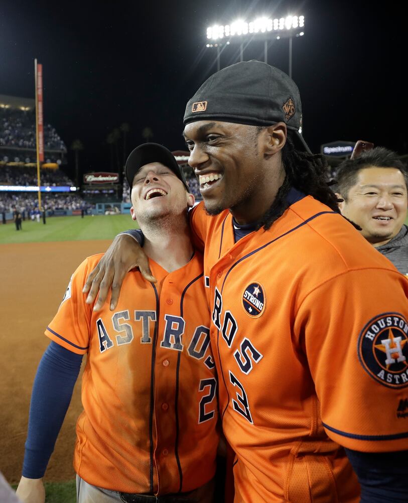 Photos: Ex-Braves McCann, Morton celebrate as Astros win World Series
