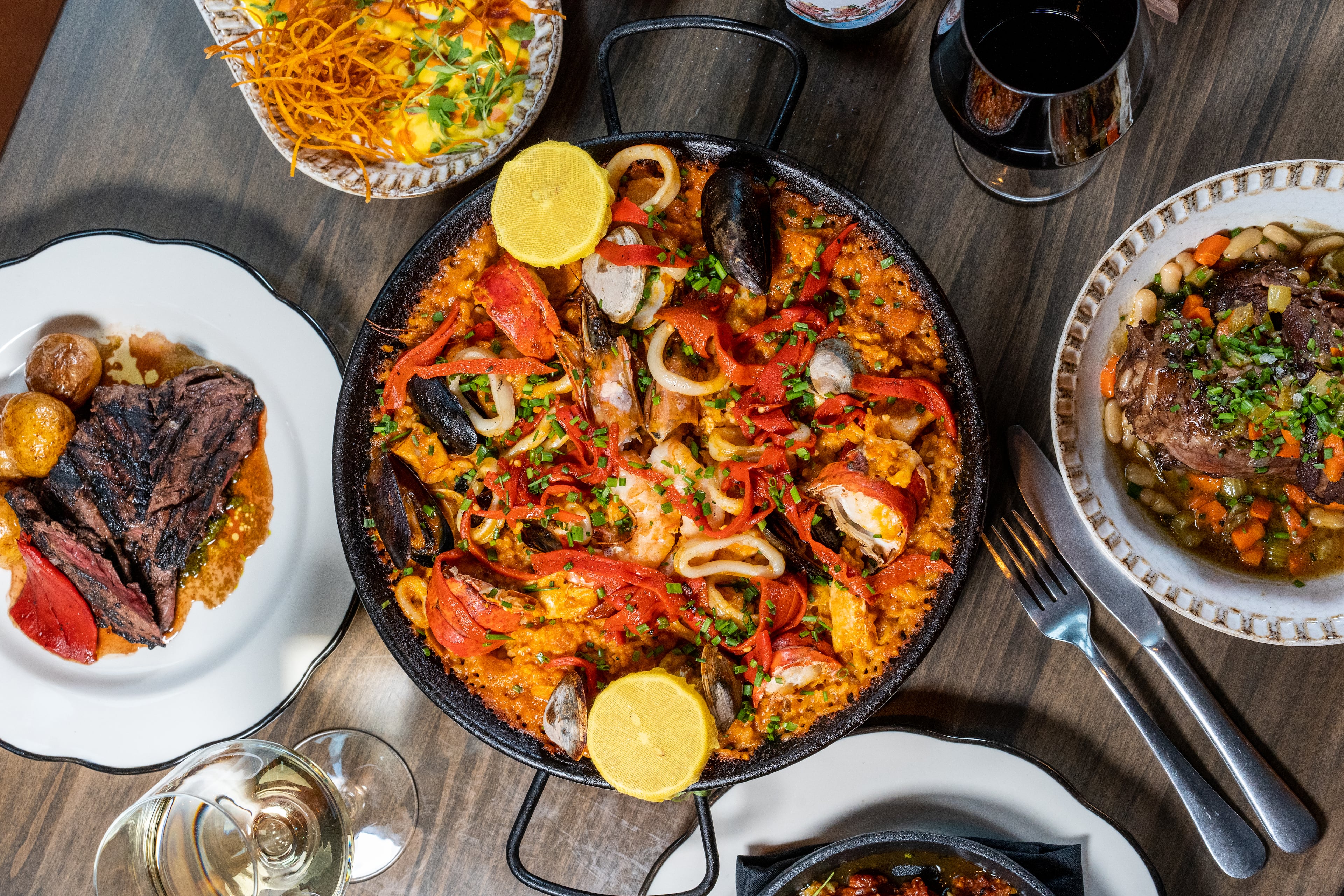 Fogón and Lions opened in 2022 offering a menu of wood-fired meats, produce and seafood. (Courtesy of Fogón and Lions)