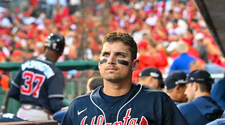 Braves third baseman Austin Riley looks on as the Philadelphia Phillies celebrate an 8-3 win that eliminated Atlanta in Game 4 of the National League Division Series on Saturday at Citizens Bank Park. (Hyosub Shin / Hyosub.Shin@ajc.com)