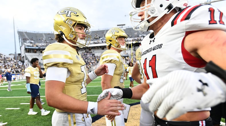 Georgia Tech quarterback Aaron Philo (left) and Gardner-Webb quarterback Finley Polk (11) greet after Georgia Tech beat Gardner-Webb during an NCAA college football game at Georgia Tech's Bobby Dodd Stadium, Saturday, September 6, 2025, in Atlanta. Georgia Tech won 59-12 over Gardner-Webb. (Hyosub Shin/AJC)